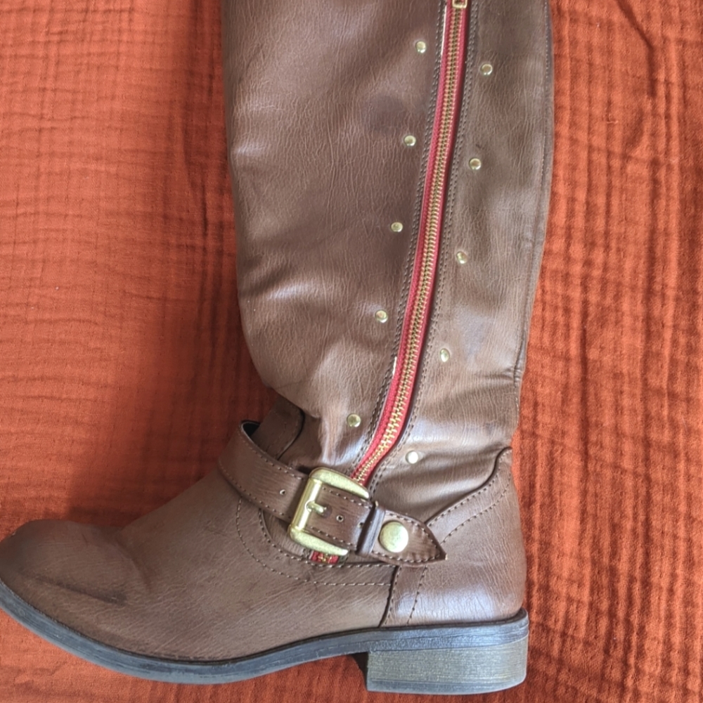 mid-calf brown boots with red and gold detailing